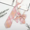 Detailed shot of Japanese JK style plaid necktie and bow tie set in pink and orange tones. - JK003 Red Tea