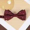 Burgundy bow tie with pink embroidered floral pattern, perfect for weddings and formal suits. - Wine Red Star Bowtie