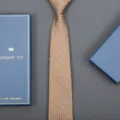 Brown patterned formal business tie with delicate geometric motifs, displayed with gift box detail. - Small Floral Zipper Style (Long Gift Box) / 8cm Wide / Khaki