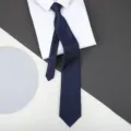 Men's navy blue striped tie matched with a crisp white dress shirt for formal business wear. - 8cm Sea Breeze Blue Zipper