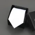 Close-up detail view of a white necktie neatly presented inside a black gift box. - 8cm White Solid Self-tie Without Box