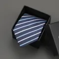 Detail view of a navy blue striped zipper necktie neatly presented in a black gift box. - 8cm LT03 Zipper Without Box