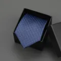 Detailed view of a classic blue business tie with elegant dot pattern inside black gift box. - 8cm Blue Stair Pattern Zipper Without Box