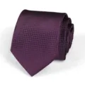 Burgundy patterned tie close up detail showing textured fabric and elegant rolled shape presentation. - Wine Red Pattern