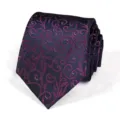 Detailed close-up of a rolled men's tie featuring intricate purple floral scroll pattern. - Purple Pattern