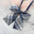 Close-up detail of the Japanese style blue plaid JK bow tie collar accessory with ribbons. - JK044 Miea Plaid Bowtie