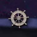 Vintage gold ship wheel brooch detailed close-up, crystal rhinestone lapel pin suit accessory. - Rudder Gold
