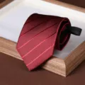 Detailed view of burgundy striped zipper tie, perfect for formal business and wedding wear. - 8cm Twill Zipper Style / Burgundy