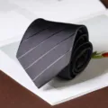Men's stylish formal business dark grey striped tie detailed view for daily wear. - Dark Striped Hand-Tied / 8cm / Dark Gray