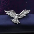 Close-up view of the retro rhinestone eagle brooch detail, exquisite suit lapel pin accessory. - Silver-Tone Eagle