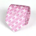 Detailed view of rolled silver necktie featuring vibrant magenta floral woven pattern texture. - Grey Rose Floral