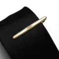 Gold metal tie clip close up detail shot, elegant star engraved design on black tie. - Tie Clip Model D (Gift Box) / Gold
