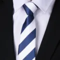 Men's blue and white striped necktie detail shot, perfect for business formal and wedding wear. - L002 Blue and White Wide Stripe