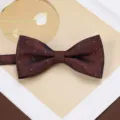 Men's vintage brown jacquard bow tie with gold dots, elegant formal suit accessory. - Star Woven Dark Brown Bowtie