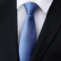 Detailed view of classic men blue business formal tie, elegant texture for professional wear. - Ocean Blue Fine Texture