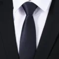 Close-up detail of a classic dark blue twill men's business necktie fabric texture. - Navy Blue Fine Texture