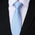 Men's light blue business formal tie detailed view, classic twill fabric for suit matching. - Sky Blue Fine Texture