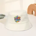 Detail shot of the beige bucket hat featuring a colorful artistic cube print on the front. - M (56-58cm) / Beige