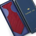 Elegant red striped men's tie packaged in a luxury blue gift box for formal wedding wear. - Zipper Style / Long Box / Burgundy Striped