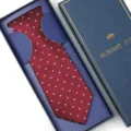 Burgundy silk necktie with white whale pattern, neatly packed in an elegant blue gift box. - Zipper Style / Long Box / Burgundy Paisley