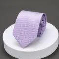 Detailed view of purple checkered tie texture closeup, elegant business style fashion detail. - Y25 Purple Plaid