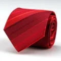 Close-up detail of red striped men's necktie showing fine fabric texture and neat fold. - D02 Striped Style