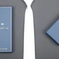 Elegant white business necktie presented with a stylish blue gift box, perfect for formal wear. - 8cm White Solid Zipper (Long Gift Box)