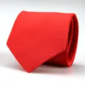 Close-up view of a classic red mens business tie showing fine diagonal twill fabric texture. - Bright Red Fine Stripe Style
