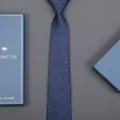 Classic blue business necktie with delicate pattern and luxury gift box, detail view. - 8cm Wave White Dot Zipper (Long Gift Box)