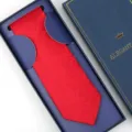 Red jacquard silk necktie packaged in an elegant navy blue gift box for formal wear. - Zipper Style / Long Box / Red Jacquard