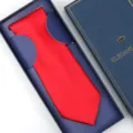 Men's solid red formal dress necktie presented in a luxury navy blue gift box packaging. - Zipper Style / Long Box / Bright Red Glossy