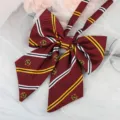 Dark red JK school style bow tie with diagonal stripes and embroidered M crest badge detail. - Burgundy Yellow Stripe M Ribbon Bow