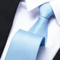 Detailed close-up of a stylish light blue striped business necktie paired with a white dress shirt. - 8cm Sky Blue Fine Texture Zipper