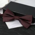 Burgundy double-layer men's bow tie detail shot, elegant formal wear accessory for weddings. - Elegant Wine Red Bowtie