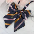 JK uniform bow tie with navy blue stripes and gold crest embroidery for cute school style. - Dark Blue White Stripe M Ribbon Bow