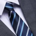 Detailed close-up view of men's classic striped business tie showcasing fine texture. - Fashion Blue Stripe Zipper Style / 8cm