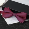 Detailed closeup view of the elegant burgundy double layer bow tie presented on a black gift box. - Rose Red Pattern Bowtie