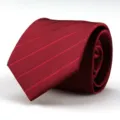 Burgundy red men's formal necktie detail view, premium woven texture for business suit wear. - Burgundy Striped Style