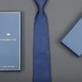 Detail view of blue paisley tie with elegant gift box packaging for business men formal wear. - 8cm Deep Blue Paisley Zipper (Long Gift Box)