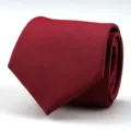 Red and black patterned men's necktie, rolled up neatly for business formal wear and weddings. - Burgundy Small Grid Style