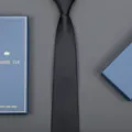 Solid black business necktie with elegant blue gift box packaging for formal wear. - 8cm Black Glossy Zipper (Long Gift Box)
