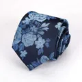 Vintage blue floral jacquard necktie for women and men, classic retro fashion accessory. - Blue Yarn