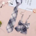 Detailed view of JK uniform plaid necktie and bow set featuring pink and blue checkered design. - JK013 White Neon Tie and Bow Tie Set