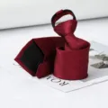 Wine red zipper necktie detail shot featuring textured fabric and convenient zip closure. - Burgundy Double Line Zipper Tie
