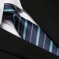 Close-up detail of the elegant blue striped business tie, showing exquisite fabric texture. - 8cm Versatile Blue Stripe Zipper