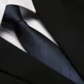 Close-up detail shot of a classic navy blue striped business necktie paired with a shirt. - 8cm Navy Blue Double Stripe Zipper