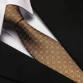 Detailed close-up shot of the elegant geometric patterned business necktie fabric texture. - 8cm Khaki Small Floral Zipper