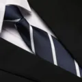 Detailed view of classic navy blue and white striped business necktie for professional office wear. - 8cm Blue Stripe Zipper