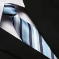 Classic striped business necktie detail shot, perfect for formal wear and professional office looks. - 8cm Cool Blue Stripe Zipper