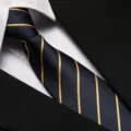 Classic navy blue tie with elegant gold diagonal stripes, perfect for business formal and meetings. - 8cm Aesthetic Gold Stripe Zipper